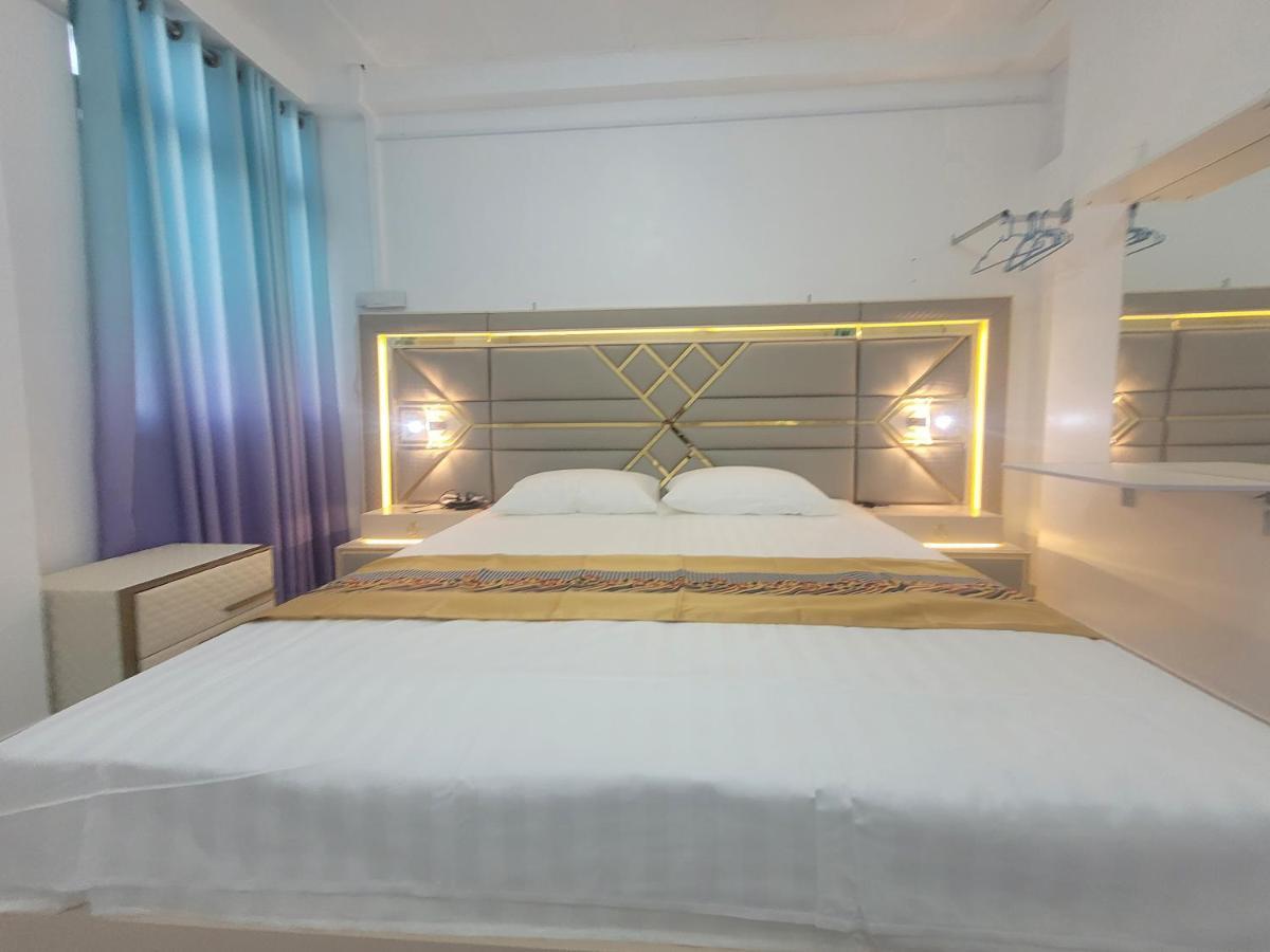 Ontrack Travel Transit Hotel Мале Екстериор снимка